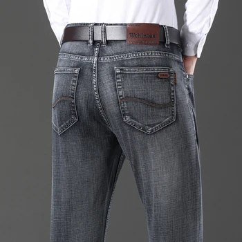 Деловые мужские джинсы повседневные, свободные, прямые, эластичные, модные, классические синие рабочие джинсовые брюки, мужская одежда, размер 28-40